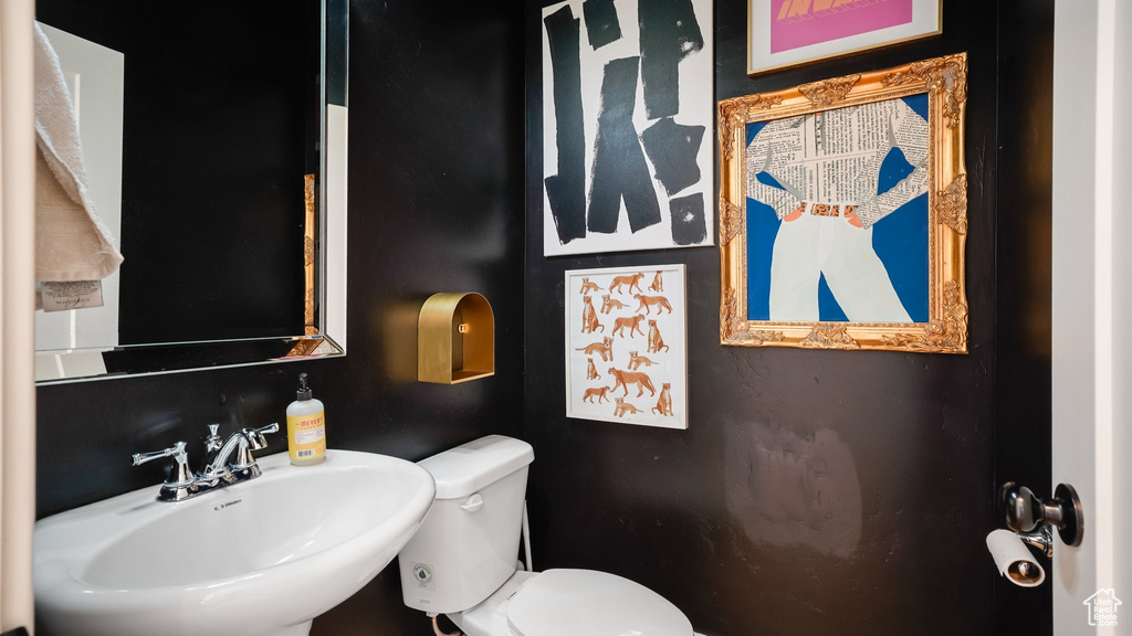 Bathroom with a sink and toilet