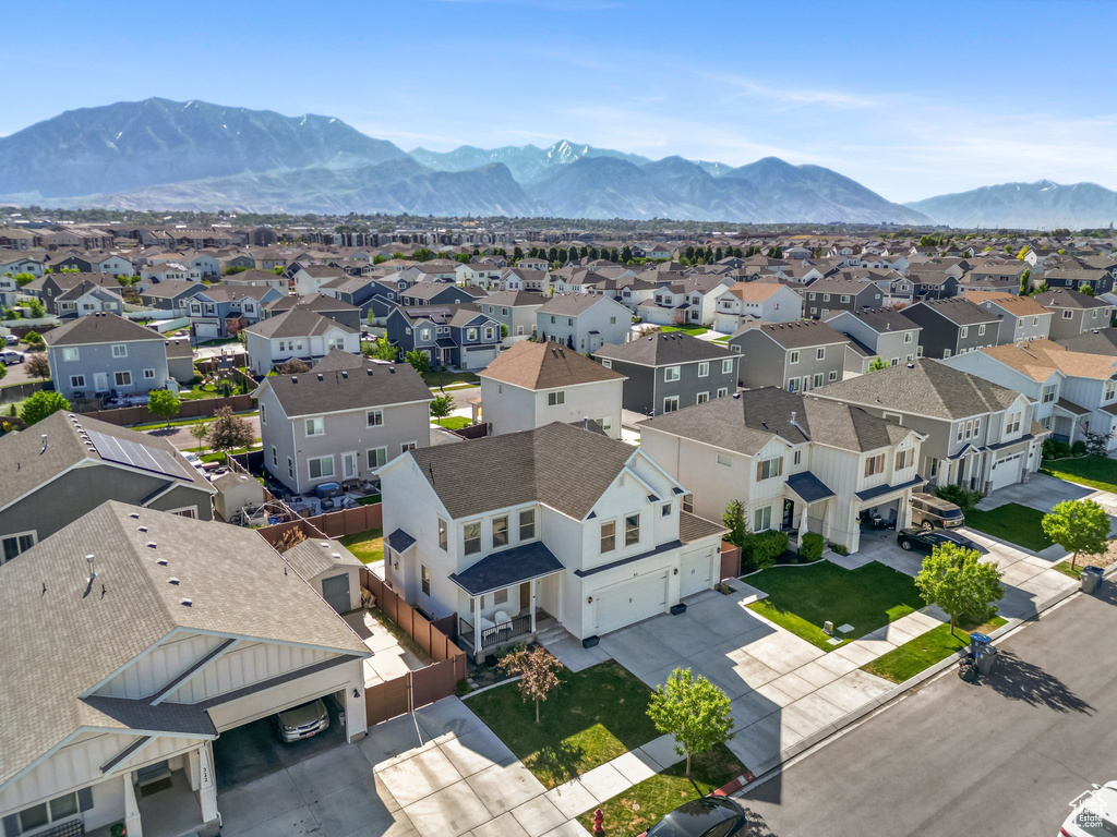 Aerial perspective of suburban area with mountains
