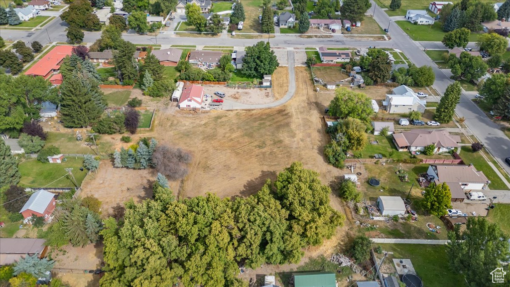 Aerial overview of property's location with nearby suburban area