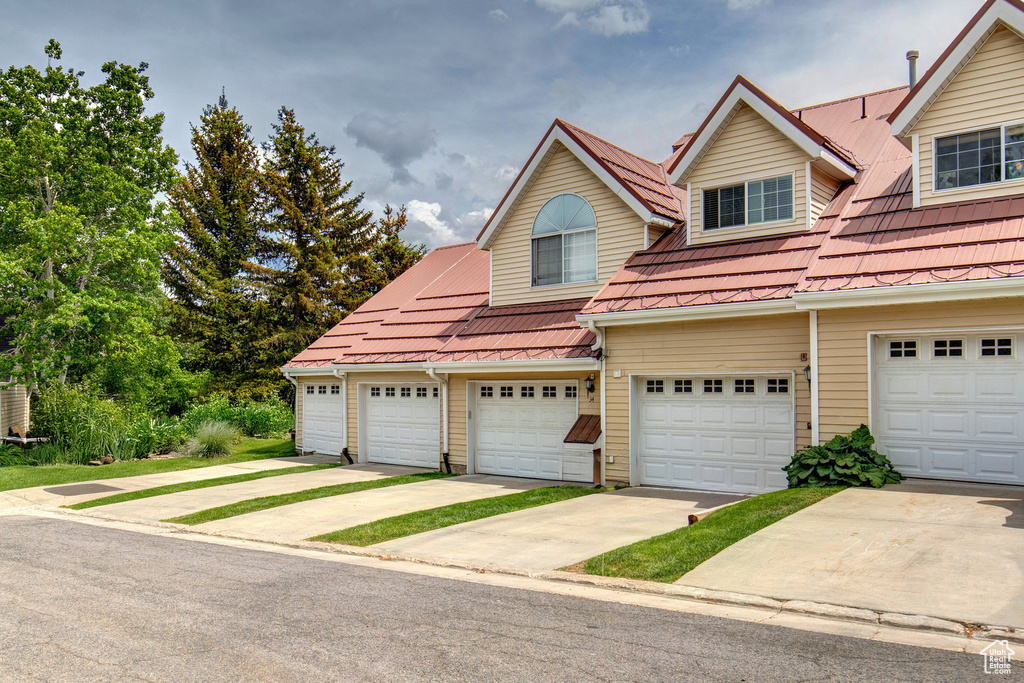 Traditional-style home featuring driveway