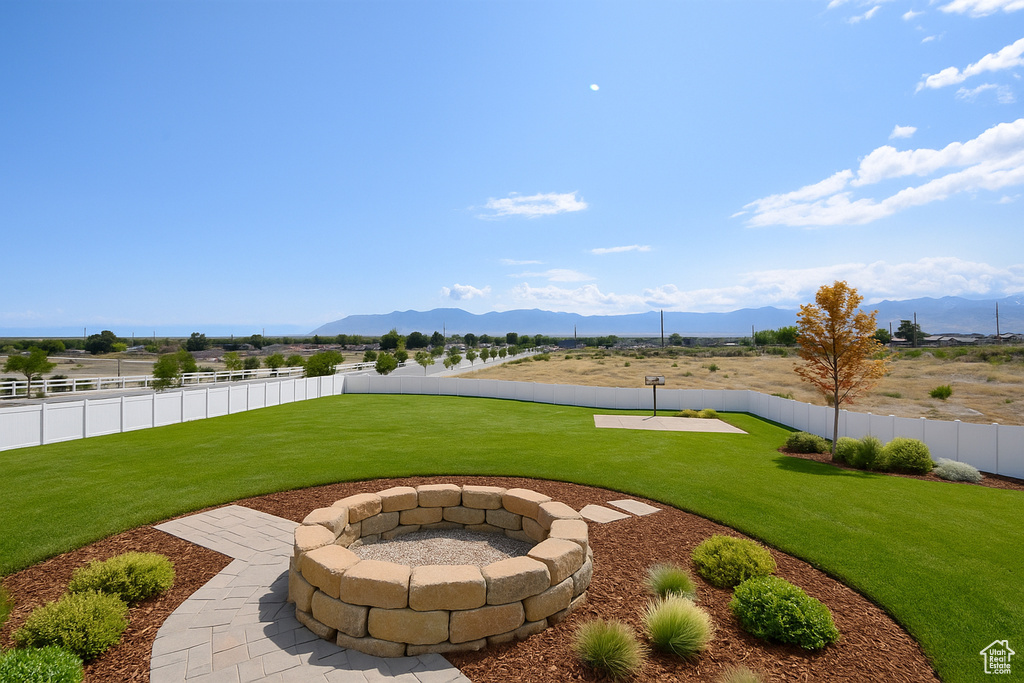 View of patio / terrace featuring a mountain view
