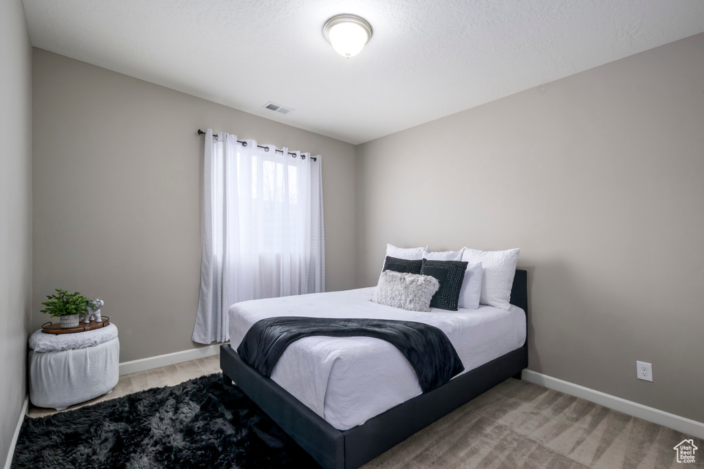 Bedroom with baseboards