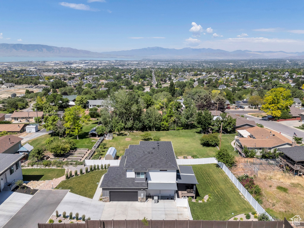 Aerial view of residential area with a mountain backdrop