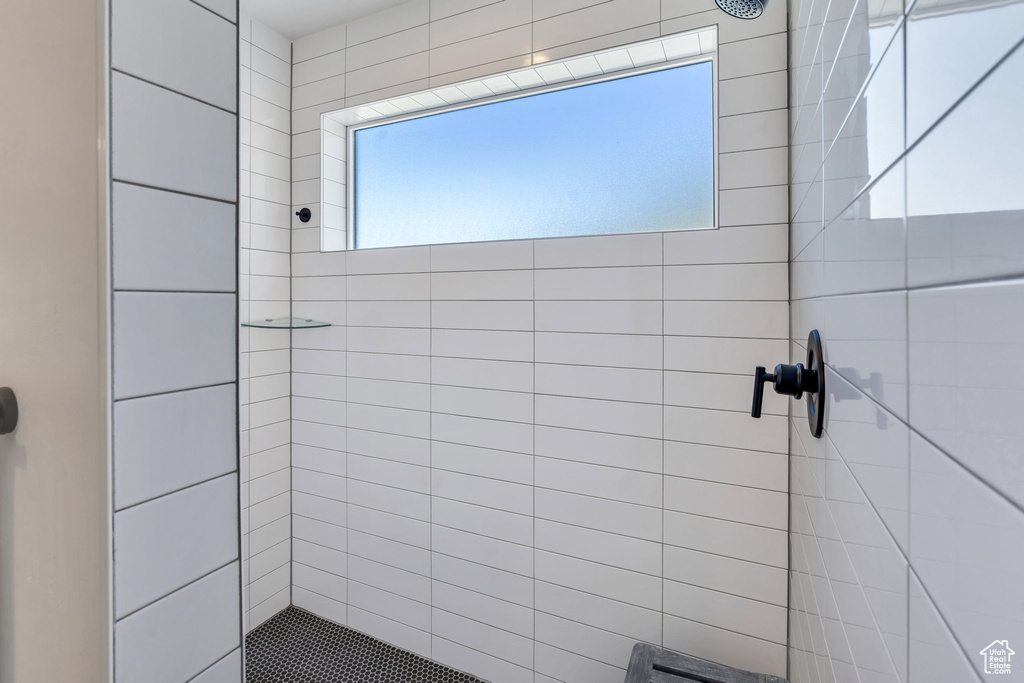 Bathroom with tiled shower
