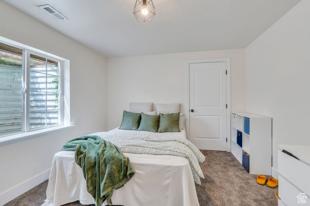 View of carpeted bedroom