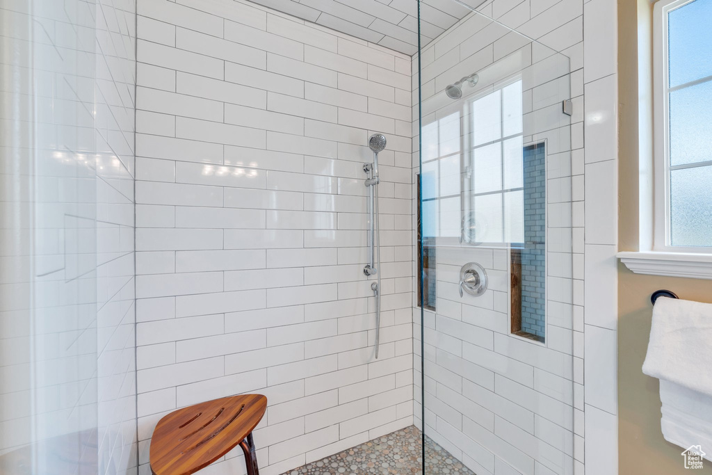 Bathroom with tiled shower