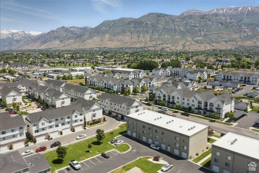 Aerial view of residential area featuring mountains