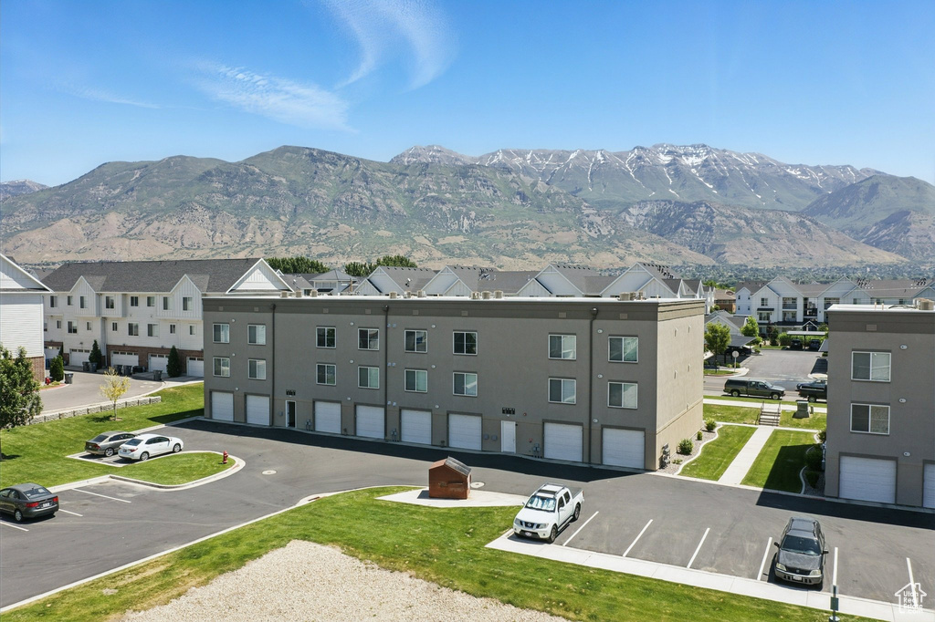 View of mountain backdrop with nearby suburban area