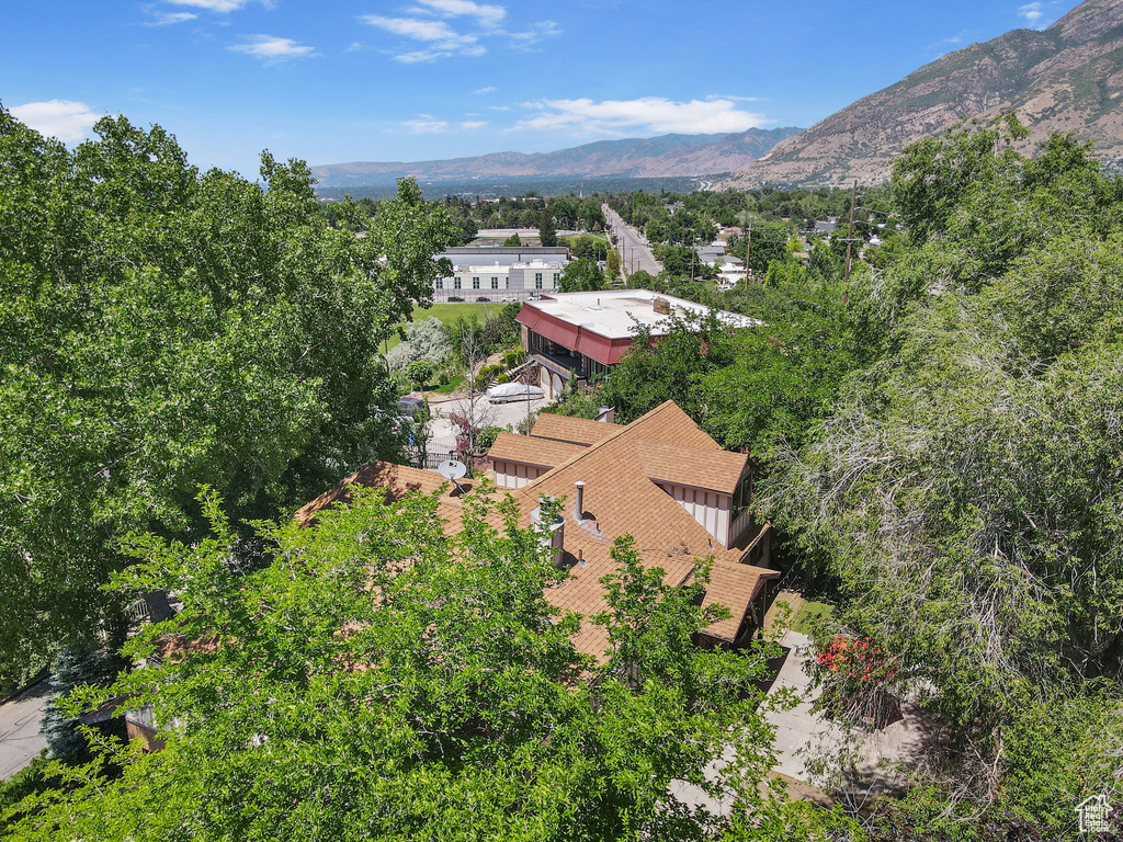 View of subject property with mountains