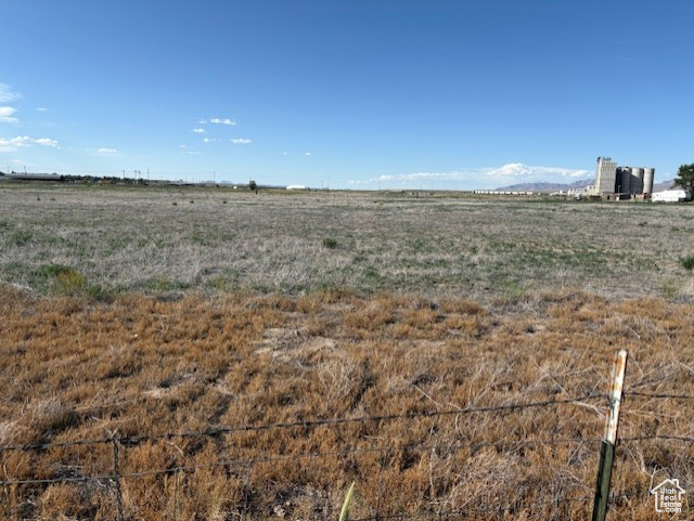 View of yard with a view of countryside