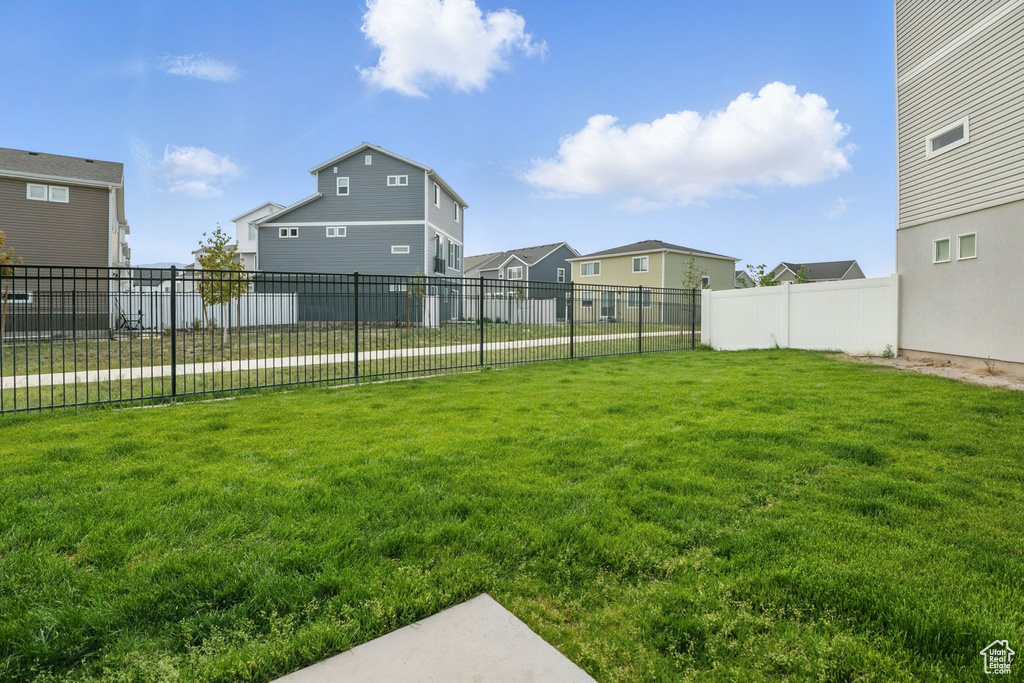 View of yard featuring a residential view