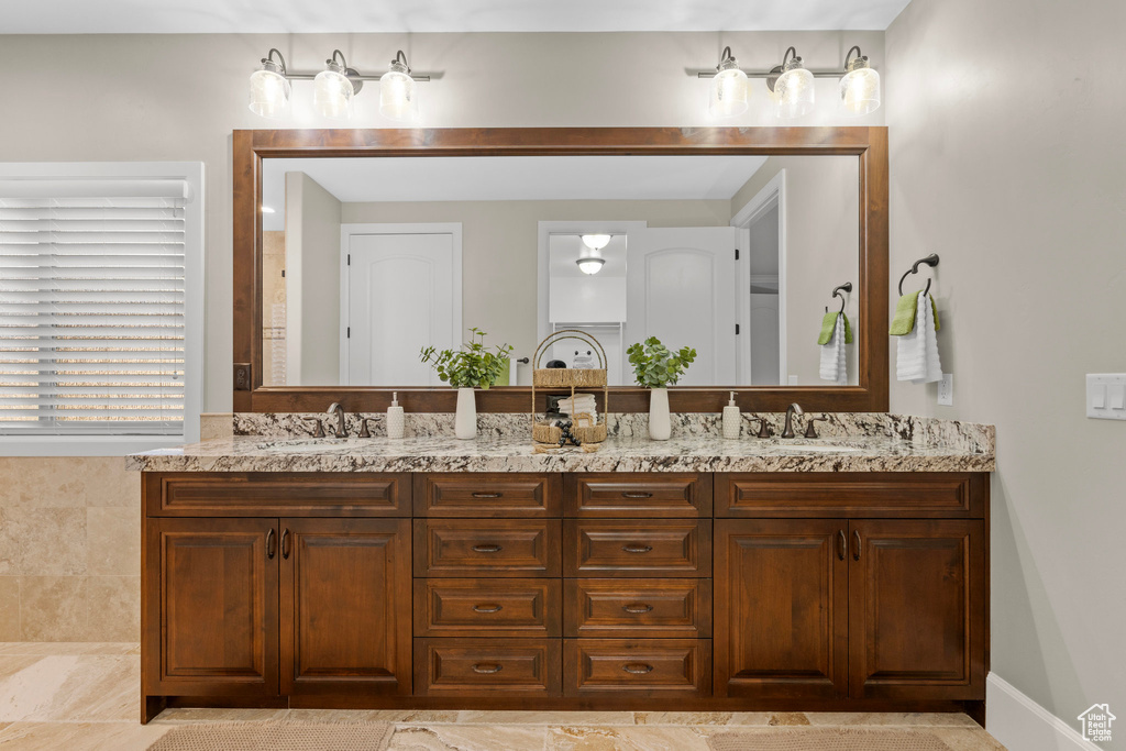 Full bathroom with double vanity