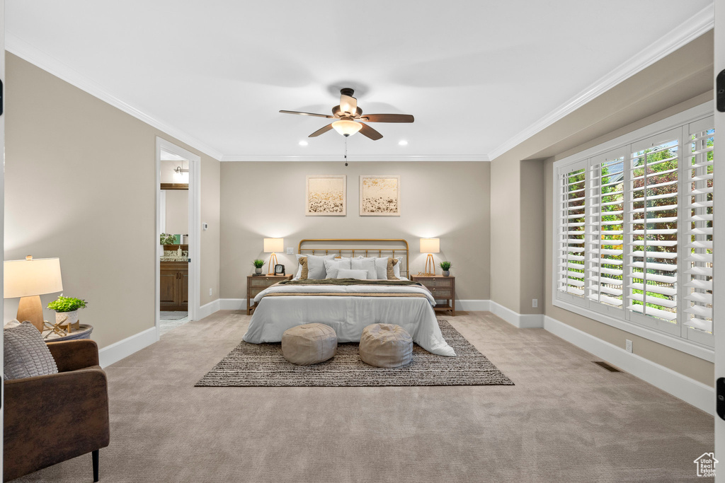 Bedroom with carpet floors, crown molding, ensuite bath, recessed lighting, and ceiling fan