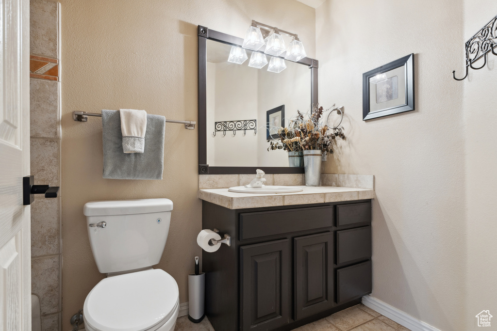 Bathroom featuring vanity and tile patterned floors