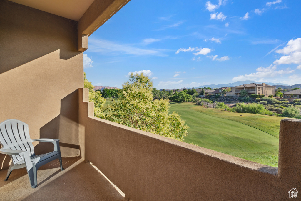 Balcony featuring a mountain view and golf course view