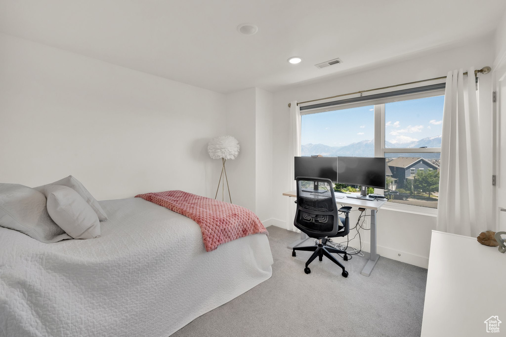 Bedroom with carpet, recessed lighting, baseboards, and an office area