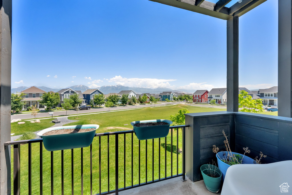 Balcony featuring a residential view