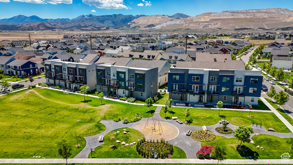Aerial view of residential area featuring mountains