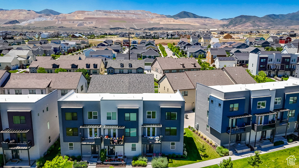 Aerial perspective of suburban area featuring mountains