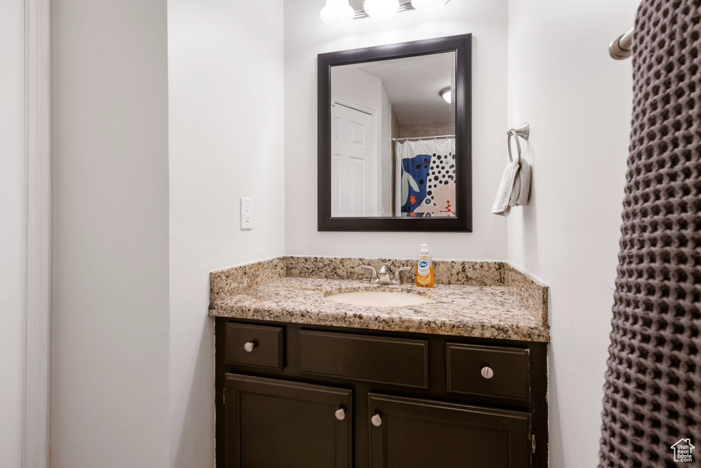 Full bathroom featuring vanity