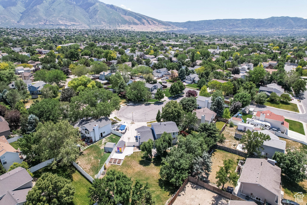 Aerial view of residential area with a mountain backdrop