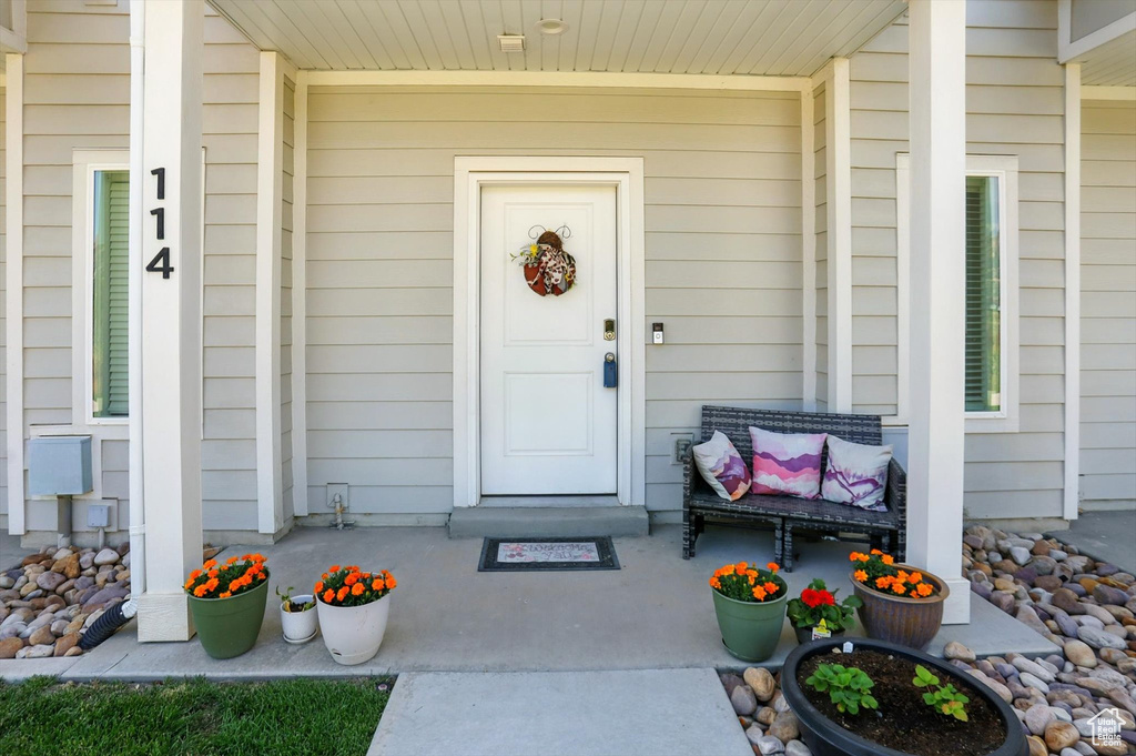 Entrance to property with a porch