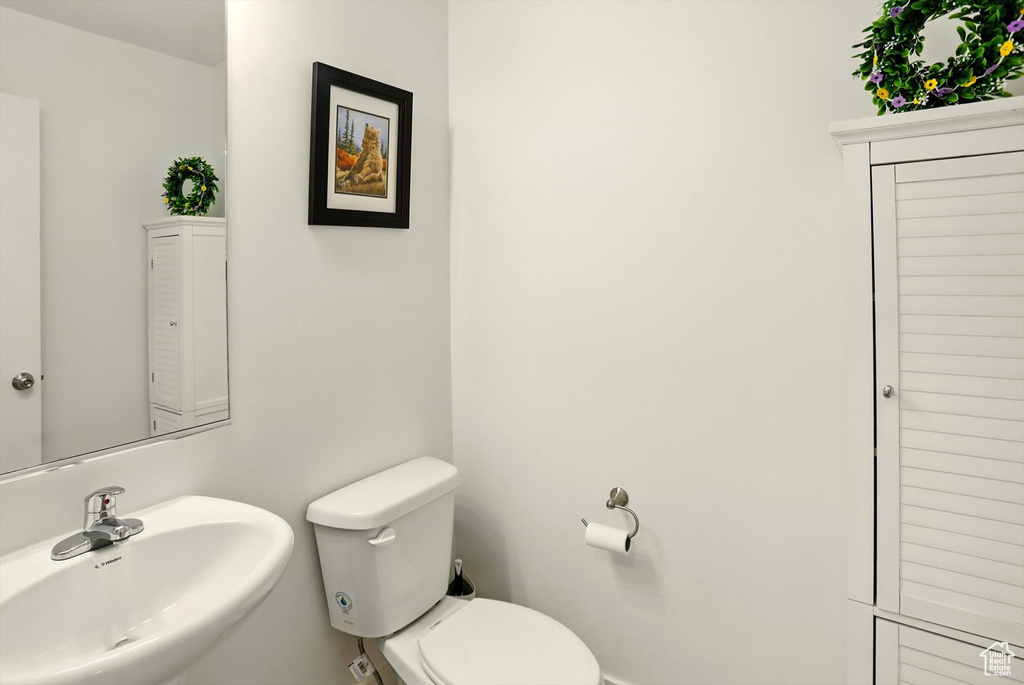Bathroom with a sink and toilet