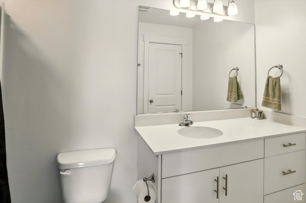 Bathroom with vanity and toilet