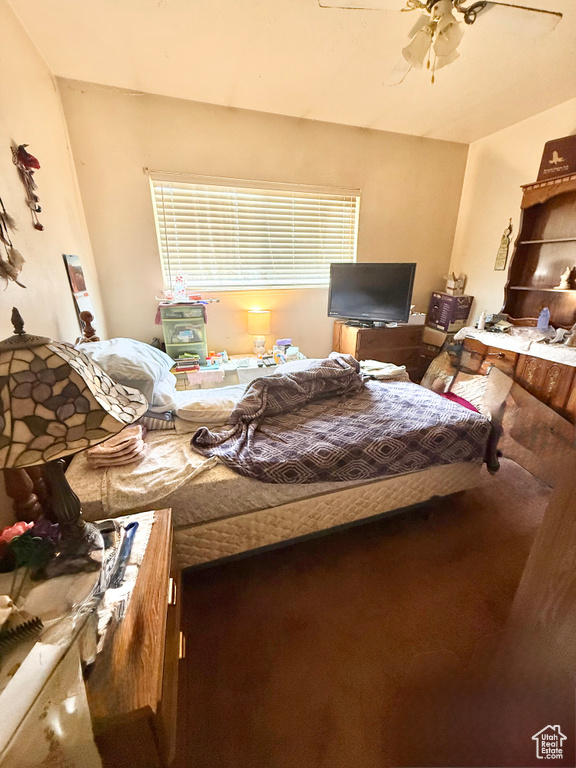 Bedroom featuring ceiling fan