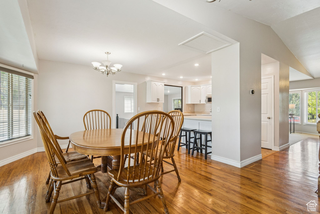 Dining space featuring light wood-style floors and recessed lighting