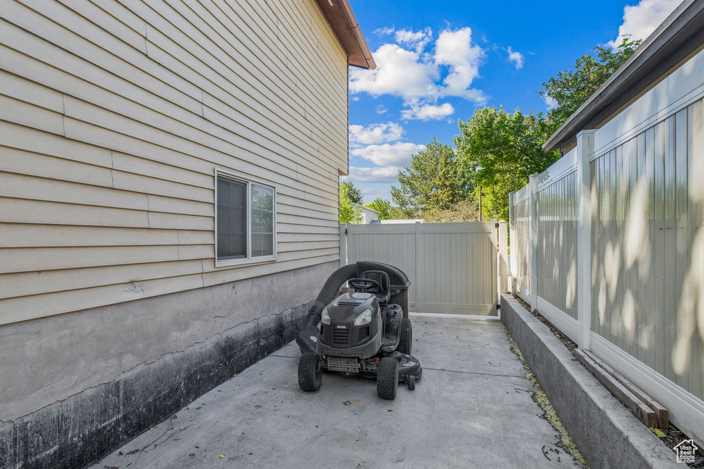 Fenced backyard featuring a patio area
