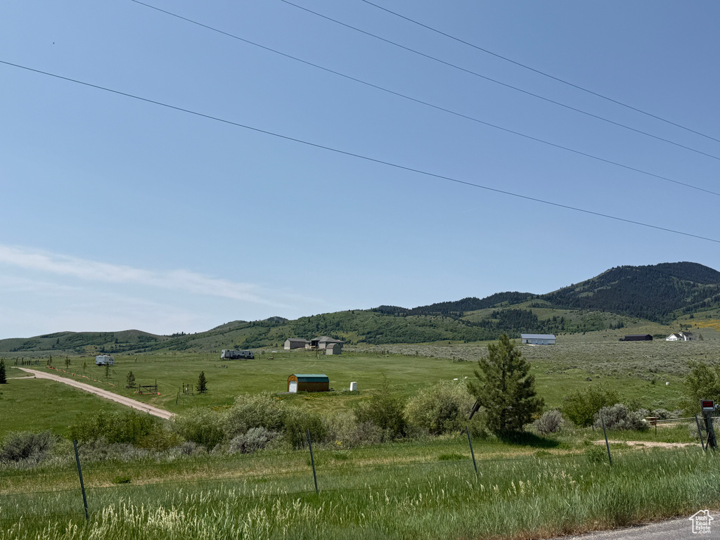 Mountain view featuring rural landscape and a pastoral area