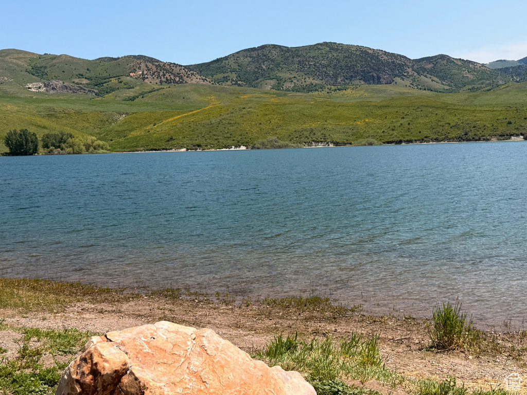 Water view featuring a mountainous background