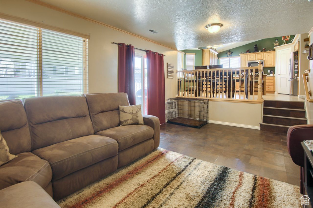 Living area featuring a textured ceiling