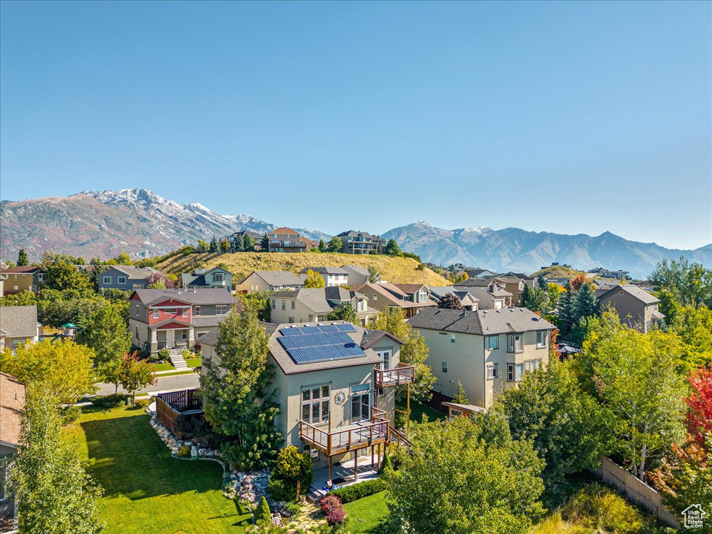 View of mountain background featuring nearby suburban area