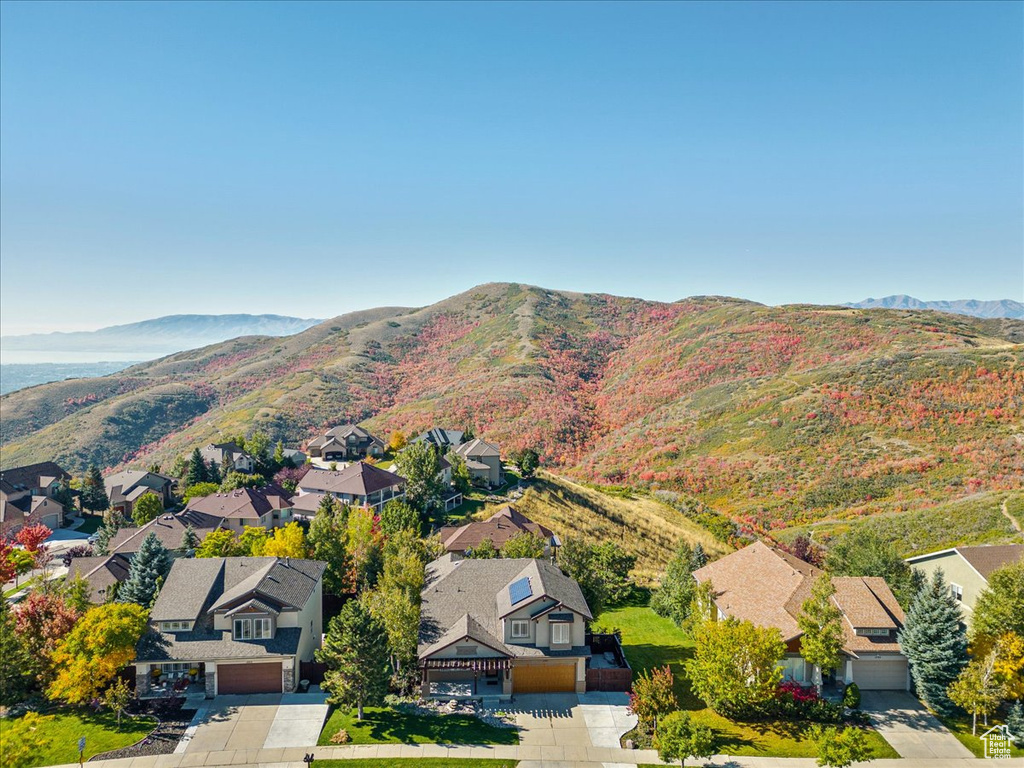 Aerial view of residential area with mountains