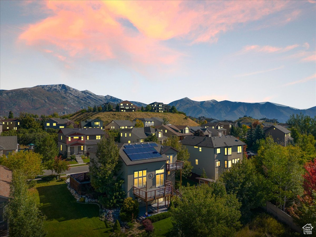 View of mountain background featuring nearby suburban area