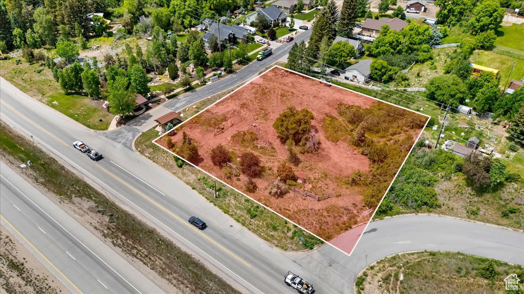 Aerial overview of property's location with property parcel outlined