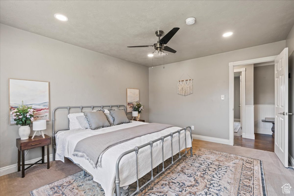 Bedroom with baseboards, recessed lighting, and a ceiling fan