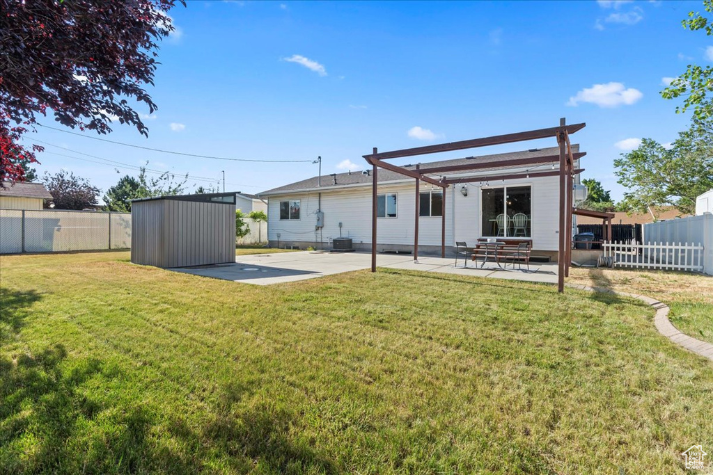 Back of house with a patio area and a pergola