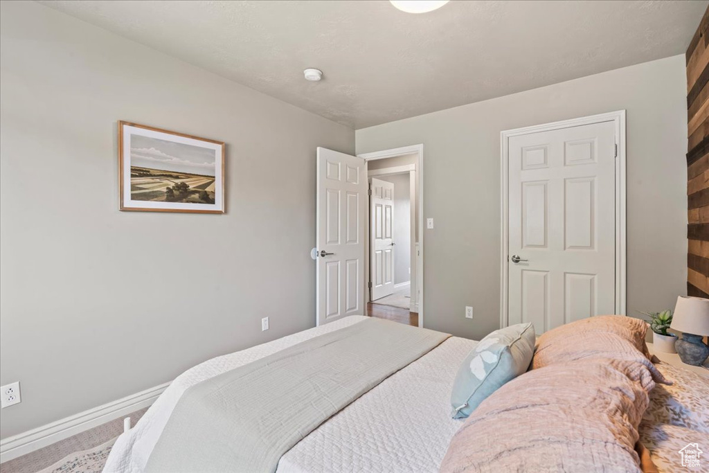 Bedroom featuring baseboards