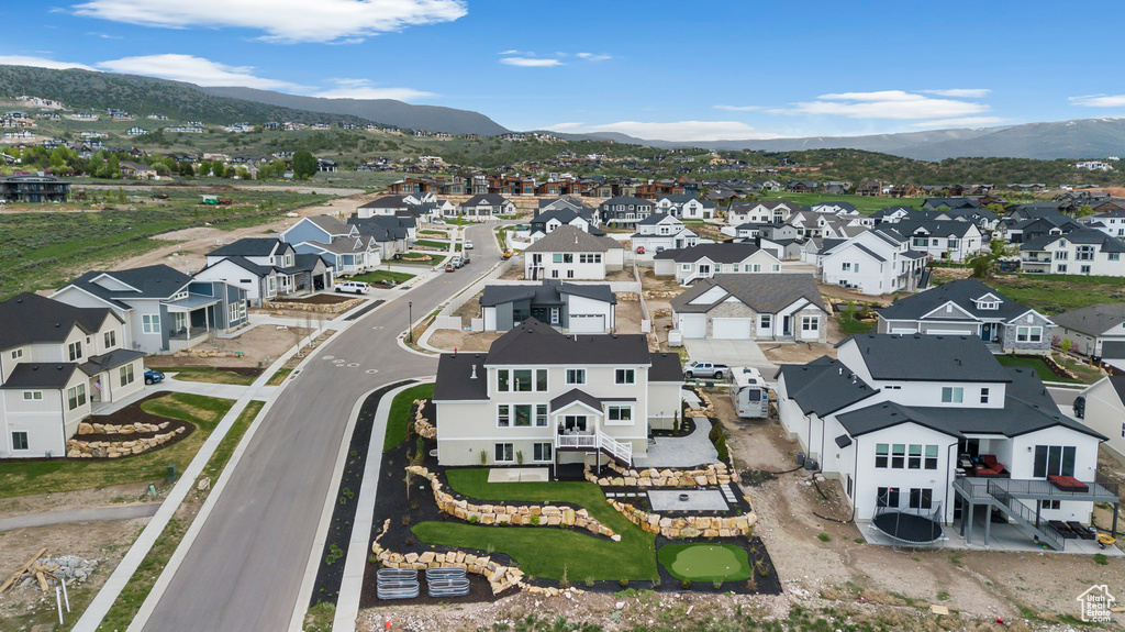 Aerial view of residential area with mountains