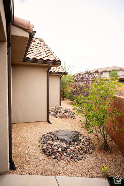 View of yard with an outdoor fire pit