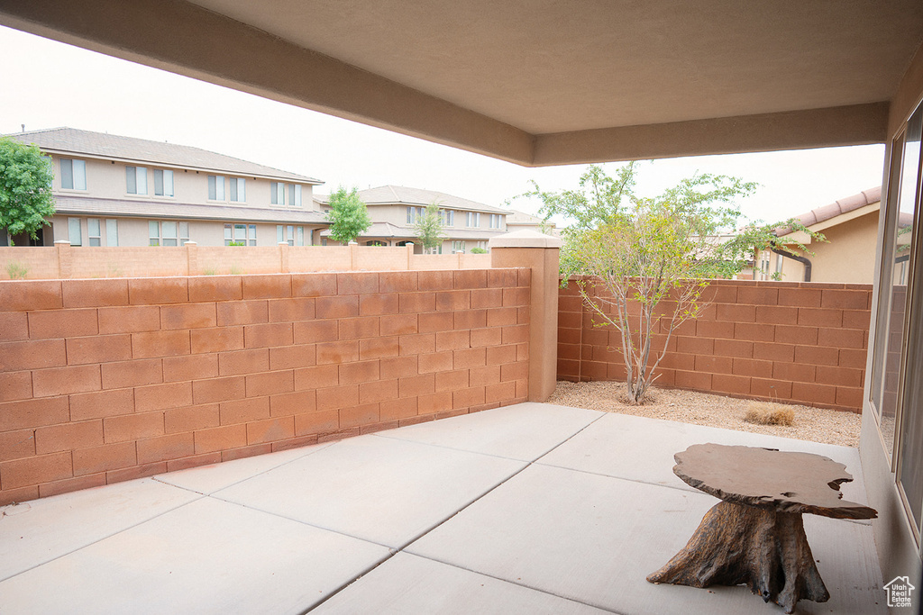 Fenced backyard featuring a patio area
