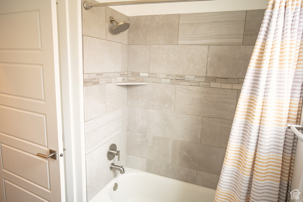 Full bathroom with shower / tub combo