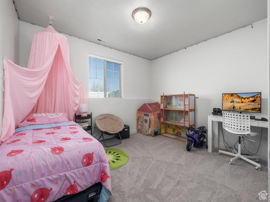 Bedroom with carpet floors