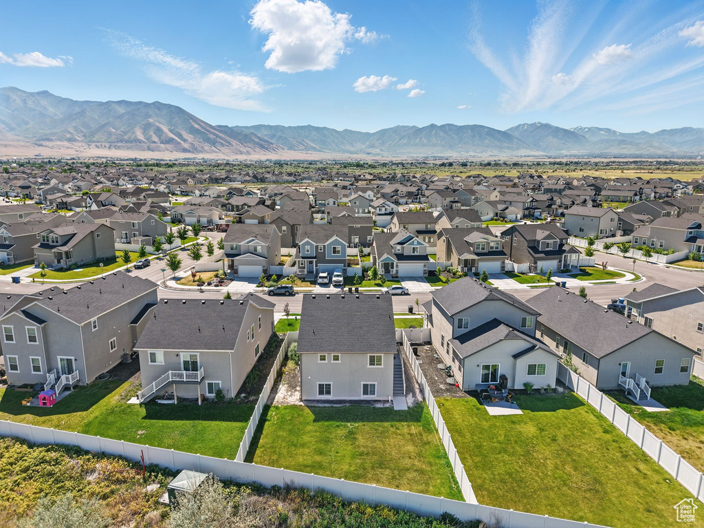 Aerial view of residential area with a mountain backdrop