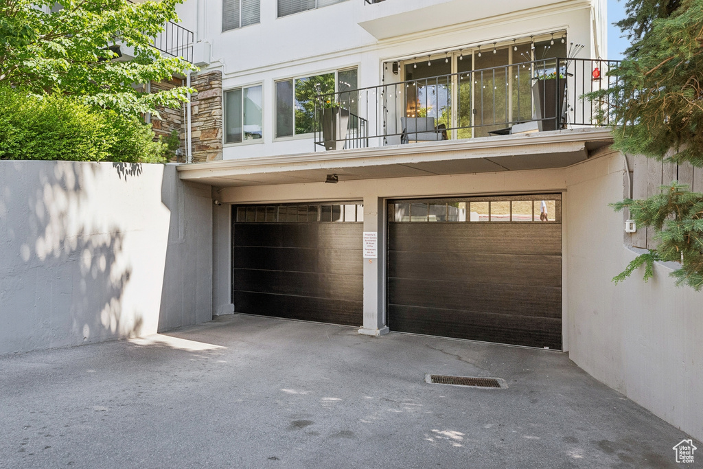 Garage featuring driveway