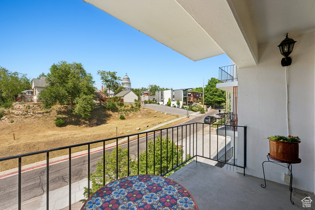 Balcony featuring a residential view
