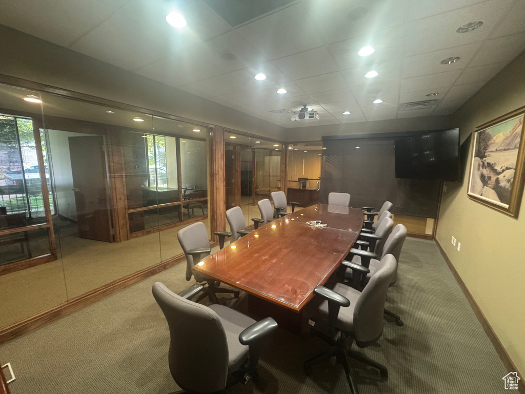 Office with carpet floors, healthy amount of natural light, and recessed lighting